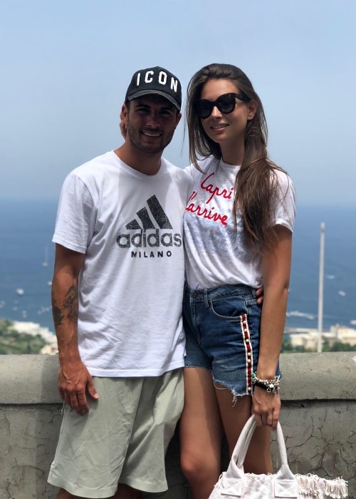 Patrick Cutrone posing happily beside a lady in Capri, Italy in July 2018