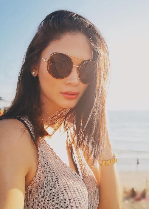Pia Wurtzbach in shades during a vacation showing off her hair in August 2018