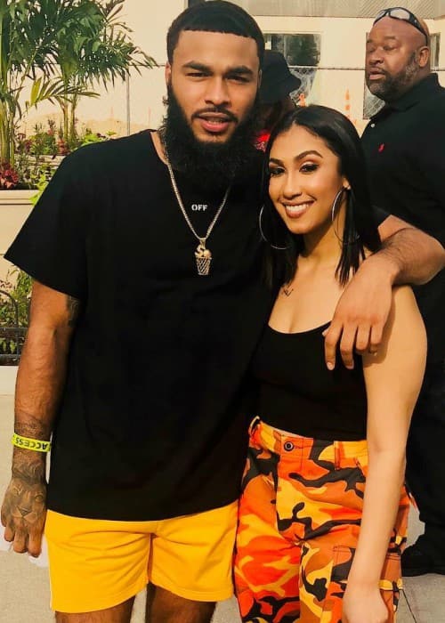 Queen Naija and Clarence White as seen in June 2018