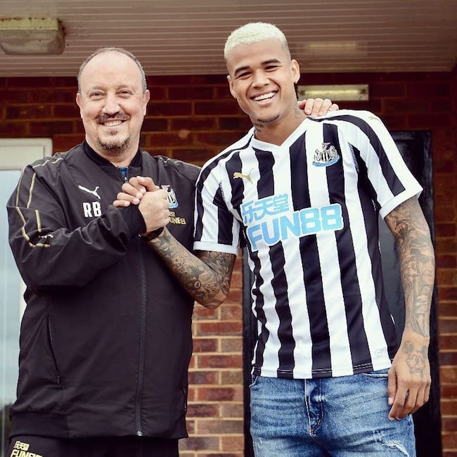 Rafael Benitez (Left) with Brazilian footballer Kenedy in July 2018