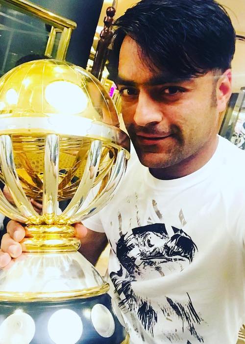 Rashid Khan with a trophy in March 2018