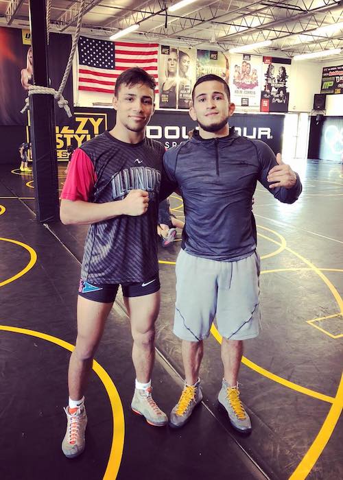 Sergio Pettis with Real Woods at Izzy Style School of Wrestling in August 2018