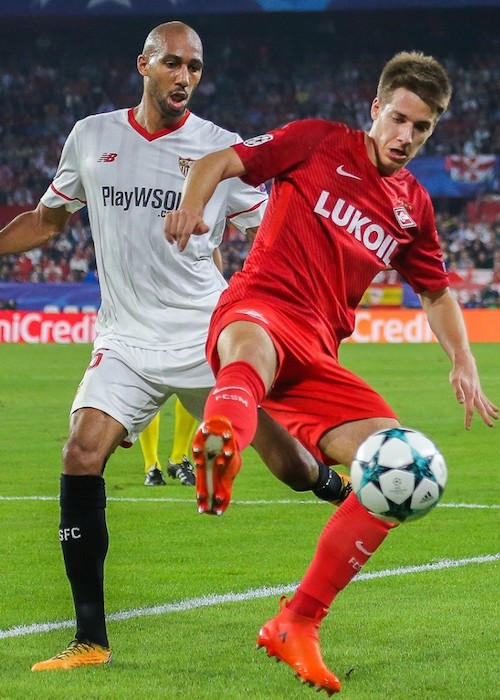 Steven N'Zonzi and Mario Pašalić while competing during a football match in 2017