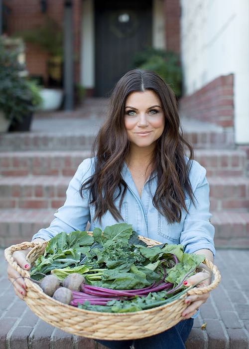 Tiffani Thiessen showing her home grown vegetables in her garden in January 2018