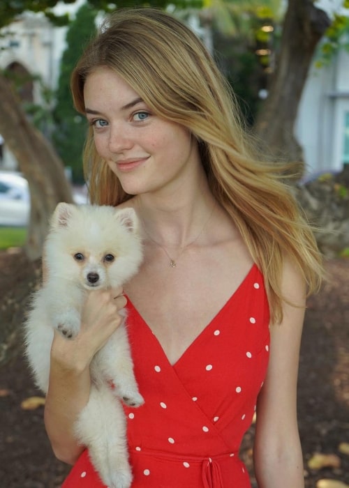 Willow Hand with her dog in Miami Beach, Florida in August 2018