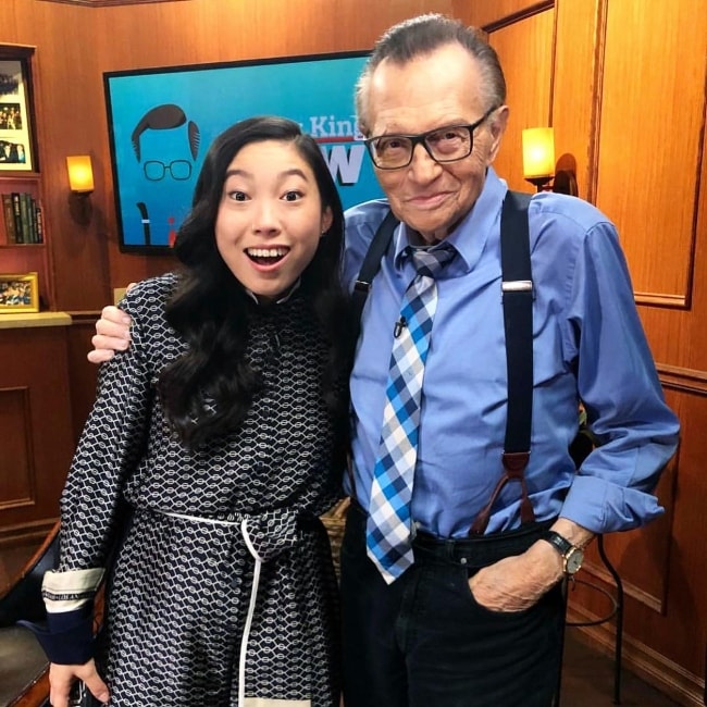 Awkwafina with Larry King in August 2018