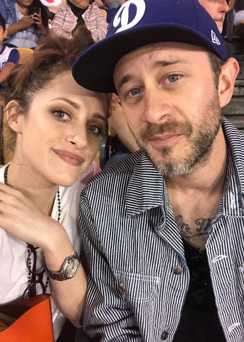 Carly Chaikin with Ryan Bunnell during a Los Angeles Dodgers match in April 2018