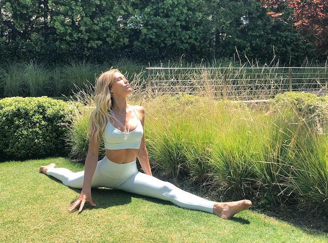 Claire Grieve out in the sun doing yoga in August 2018