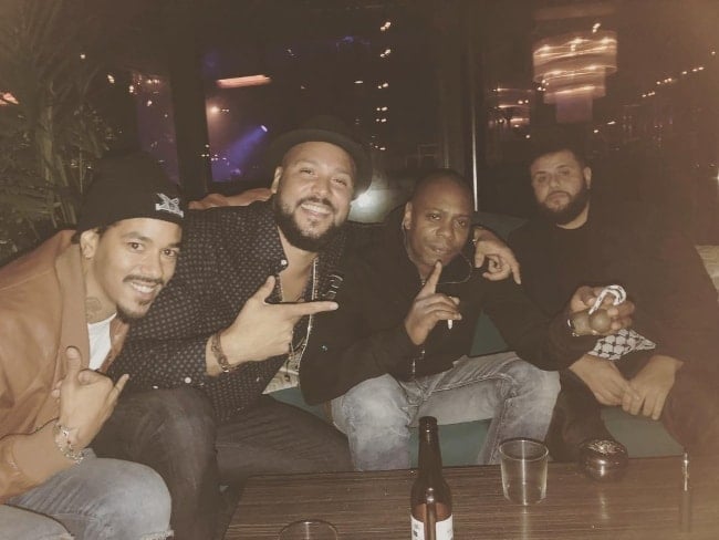 Dave Chappelle (Second Right) enjoying his time in October in 2018