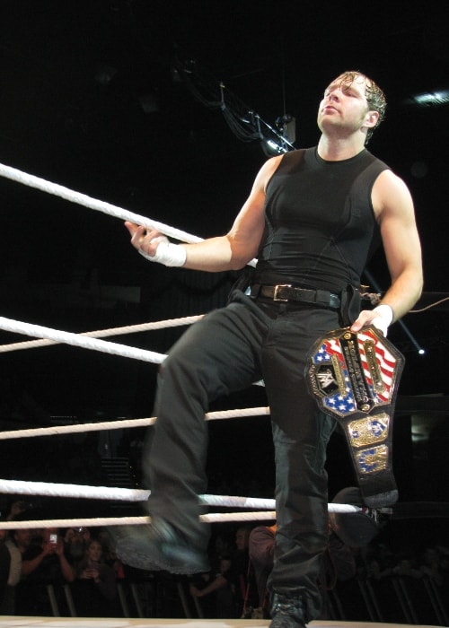Dean Ambrose standing by the ring in July 2013