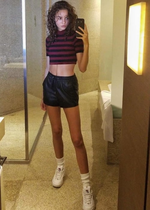EMM Arruda in a mirror selfie in Shanghai, China in September 2018