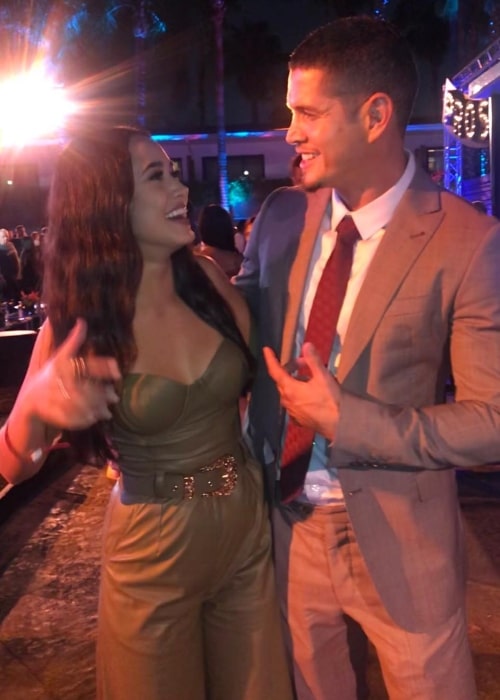 Emily Tosta sharing a laugh with JD Pardo in September 2018