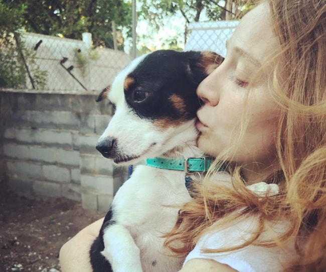 Kayli Carter with her dog in June 2017