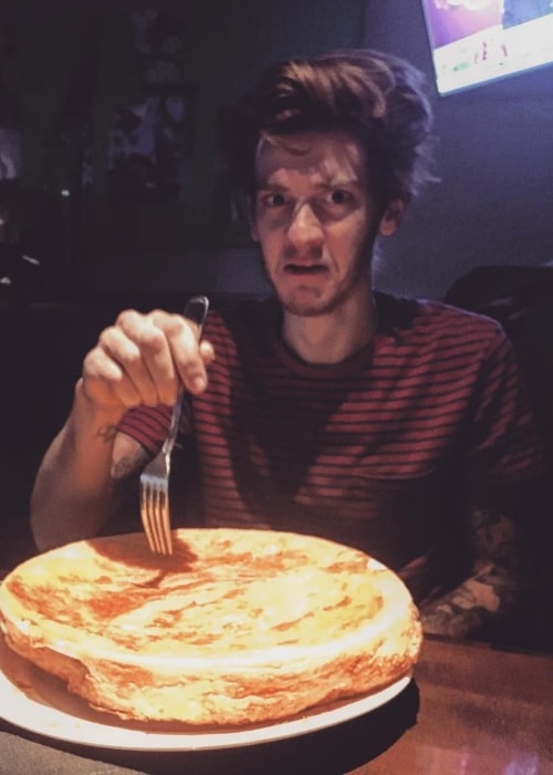 Nick Santino pictured with a pot pie in Seattle, Washington in December 2016