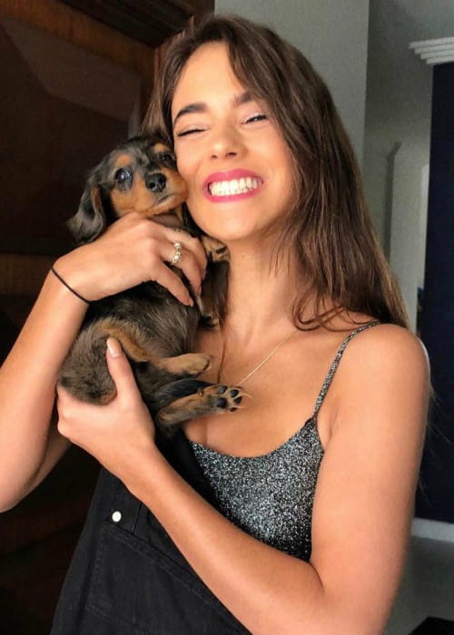 Renee Herbert with her dog as seen in July 2018