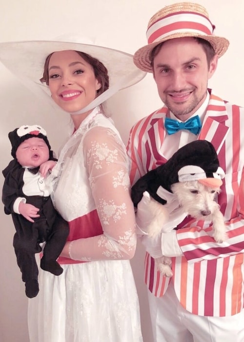 Amber Stevens West posing with her family in November 2018