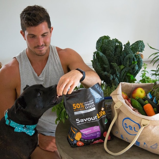 Drew Harrisberg with his dog Dennis in November 2018