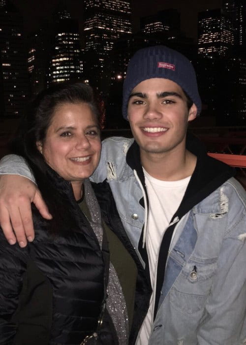 Emery Kelly with his mother as seen in May 2018