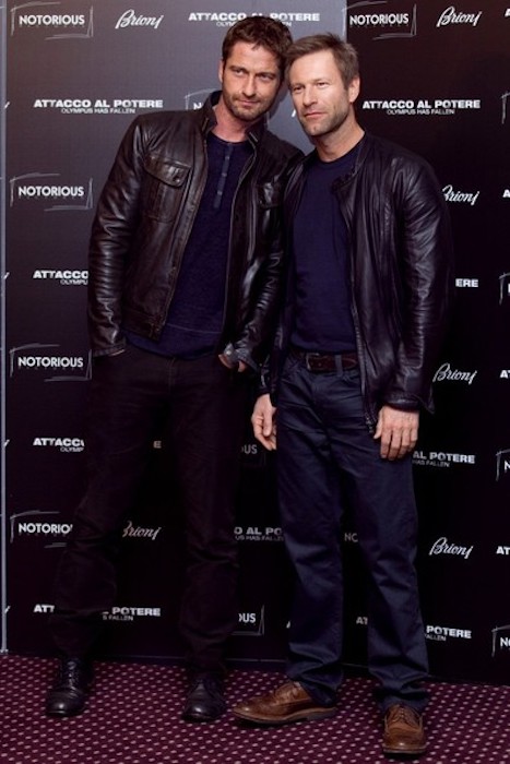 Gerard Butler (Left) and Aaron Eckhart during the photocall for their film "Olympus Has Fallen" in 2013