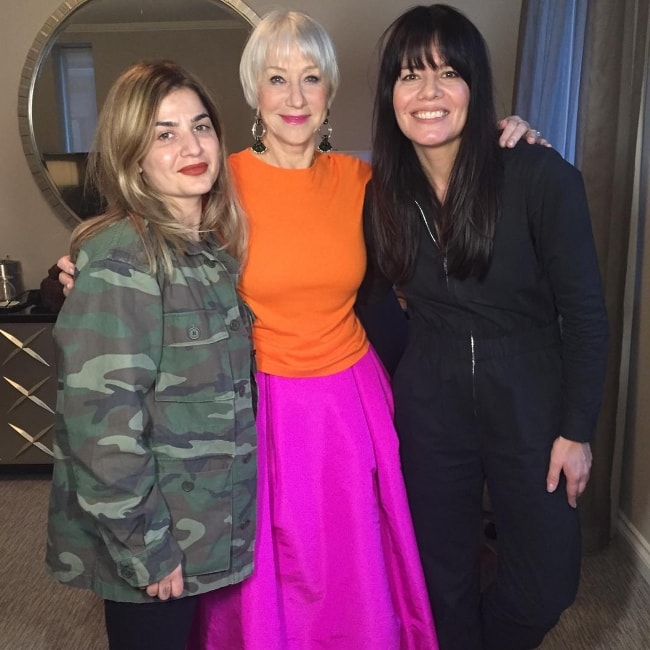 Helen Mirren (Center) with her hair and makeup team members in March 2018