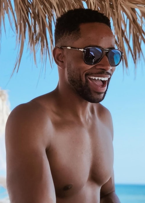 Jay Ellis shirtless in Santorini Greece in July 2018