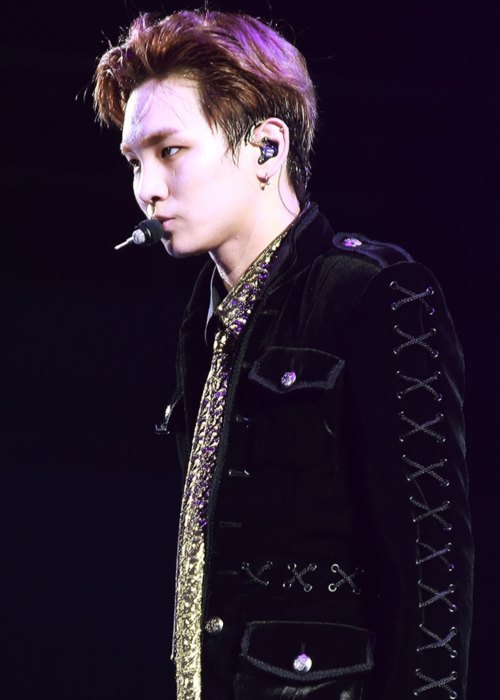 Key during a performance in May 2014