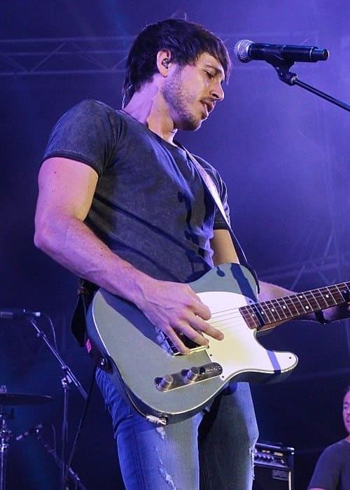 Morgan Evans performing on stage at CMC Rocks in March 2016