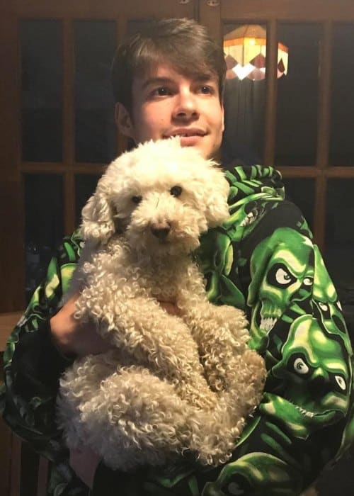 Rex Orange County with his dog as seen in May 2018