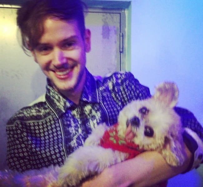 Adam Hann with his dog as seen in December 2014