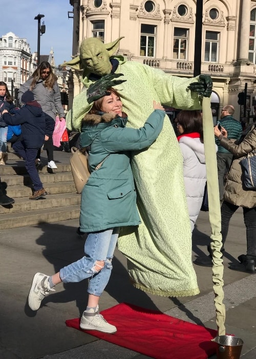 Elçin Sangu at Piccadilly Circus in February 2018