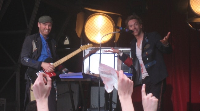 Jonny Buckland (Left) with Chris Martin in June 2008