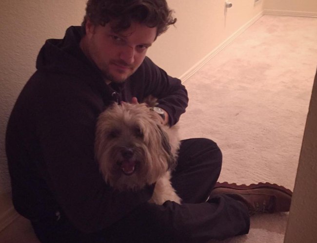 Matt Jones with his dog as seen in December 2015