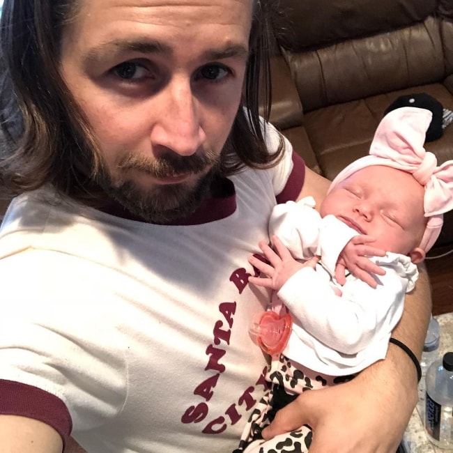 Michael Angarano in a selfie with his god-daughter in February 2018