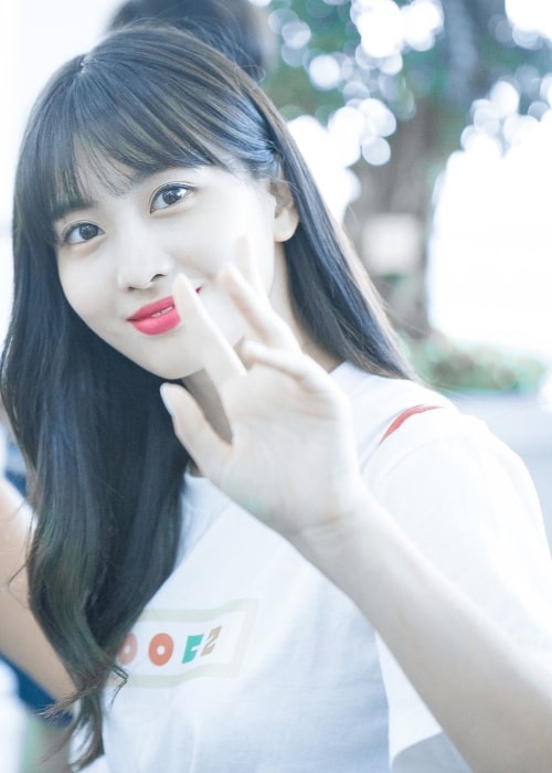 Momo as seen while waving at the camera