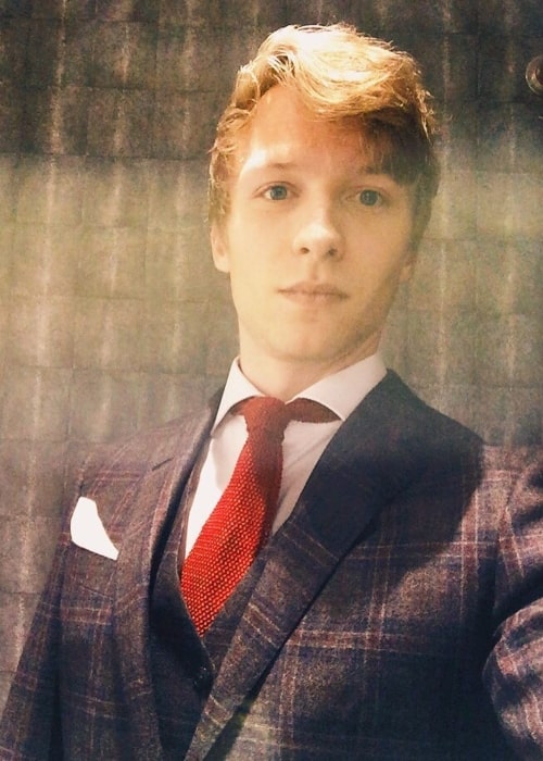 Will Tudor taking a selfie suited-up for the Instyle BAFTA party in February 2016