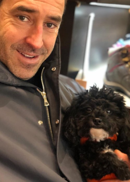 Chris Fischer in a selfie with his dog as seen in November 2018