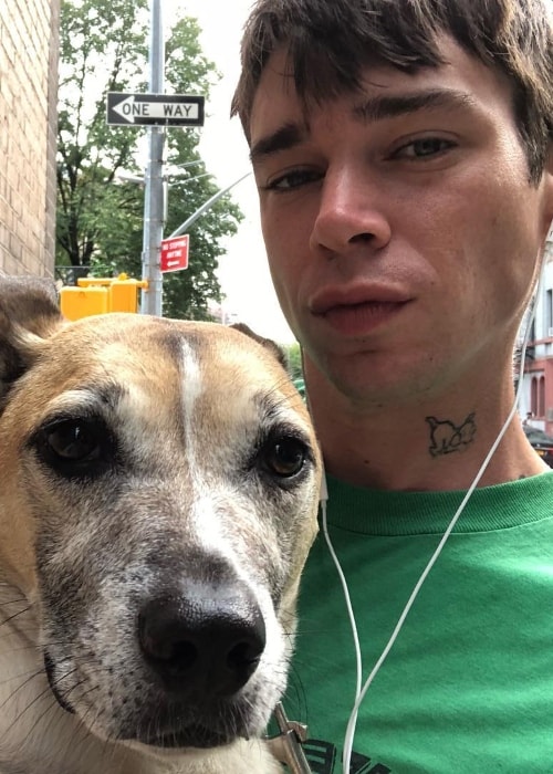 Cole Mohr in a selfie with his dog in August 2018