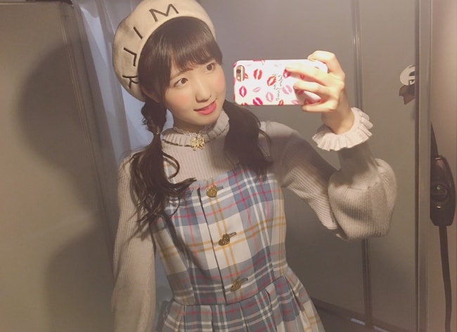 Hitomi Honda taking a mirror selfie in August 2018