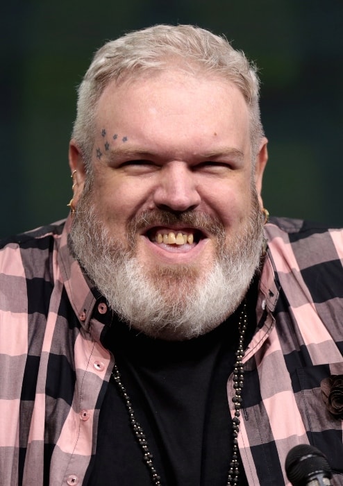 Kristian Nairn smiling during the San Diego Comic-Con International in July 2017