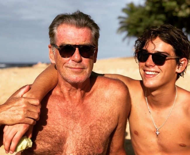 Paris Brosnan posing shirtless with his father in November 2018