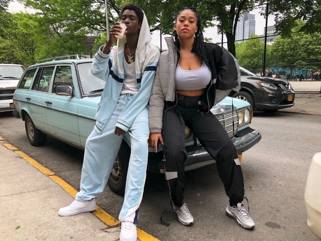 Alton Mason posing with Jordyn Woods in May 2018