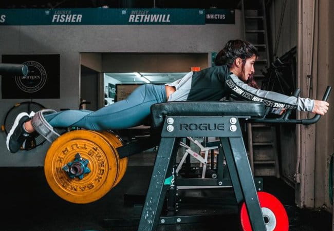 Lauren Fisher exercising on a reverse hyper machine as seen in January 2019