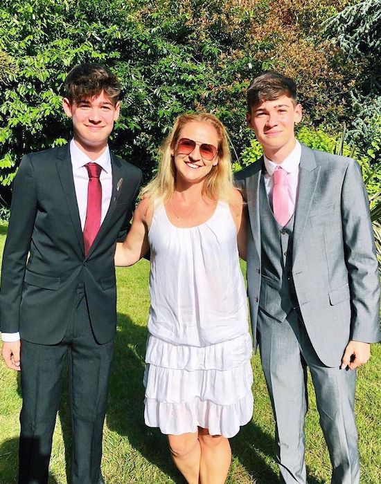 Max and Harvey with their mother Sara in their prom dress in June 2019