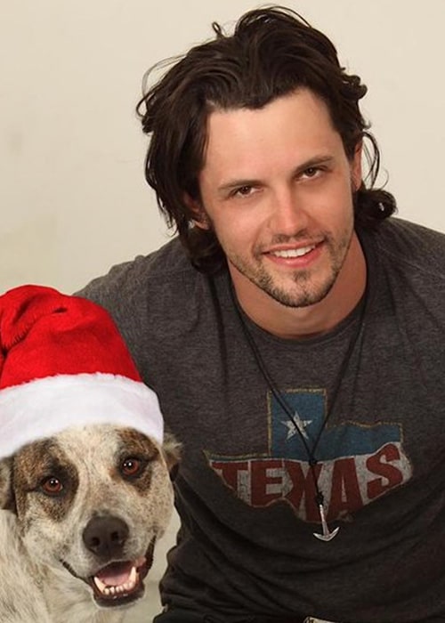 Nathan Parsons with his Favourite non-human Charlie as seen on his Twitter Profile