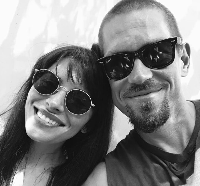 Steve Howey in a black-and-white selfie with Sarah Shahi in July 2018