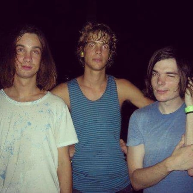 Dominic Simper as seen in a picture with Kevin Parker and Jay Watson