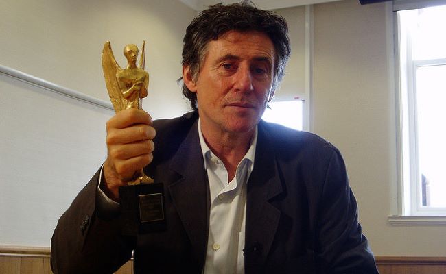 Gabriel Byrne shows off his Herald Angel in August 2006