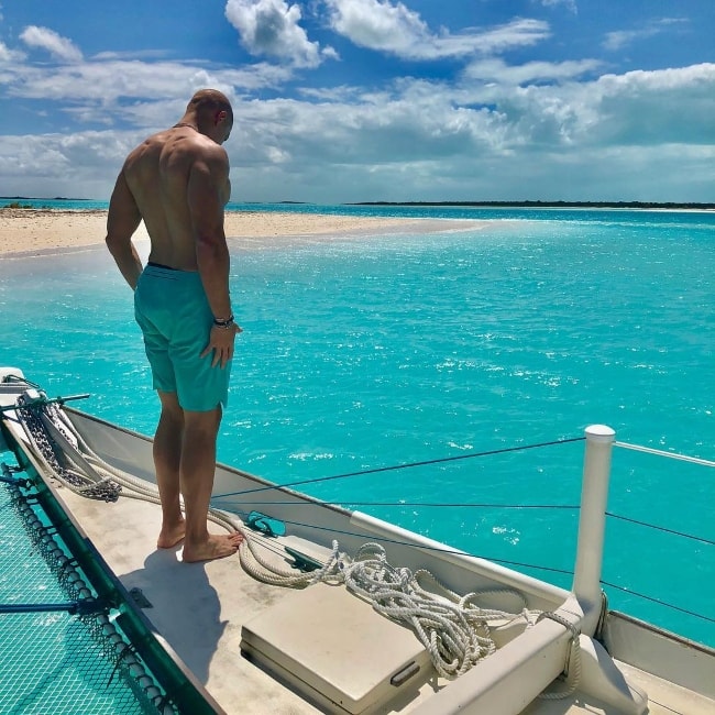 Jimmy Graham posing shirtless in April 2018