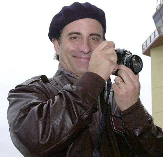 Andy Garcia taking a picture at the Incirlik Air Base in Turkey in December 2001