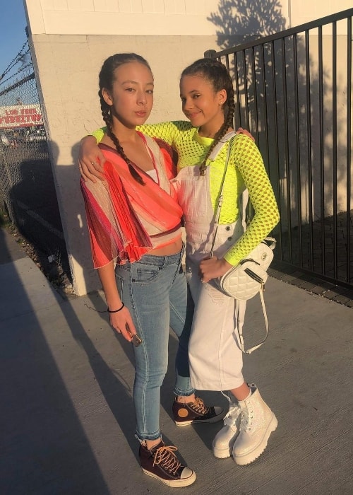 Aubrey Anderson-Emmons as seen while posing with her friend for more than 9 years, Scarlet Spencer, on the birthday of YouTuber JoJo Siwa in April 2019